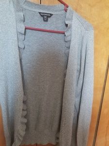 Its sliver with some sparkles on it it's a XL